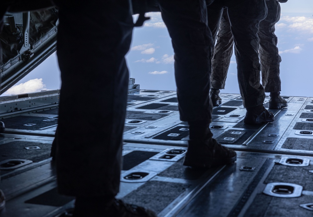 Marines, Airmen, and Soldiers Jump From C-130 Hercules