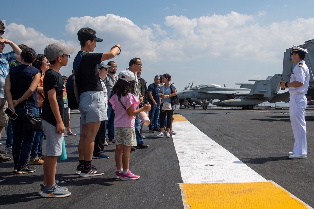 USS Ronald Reagan (CVN 76) hosts Republic of Philippines US embassy staff members during a scheduled port visit to Manila, Philippines
