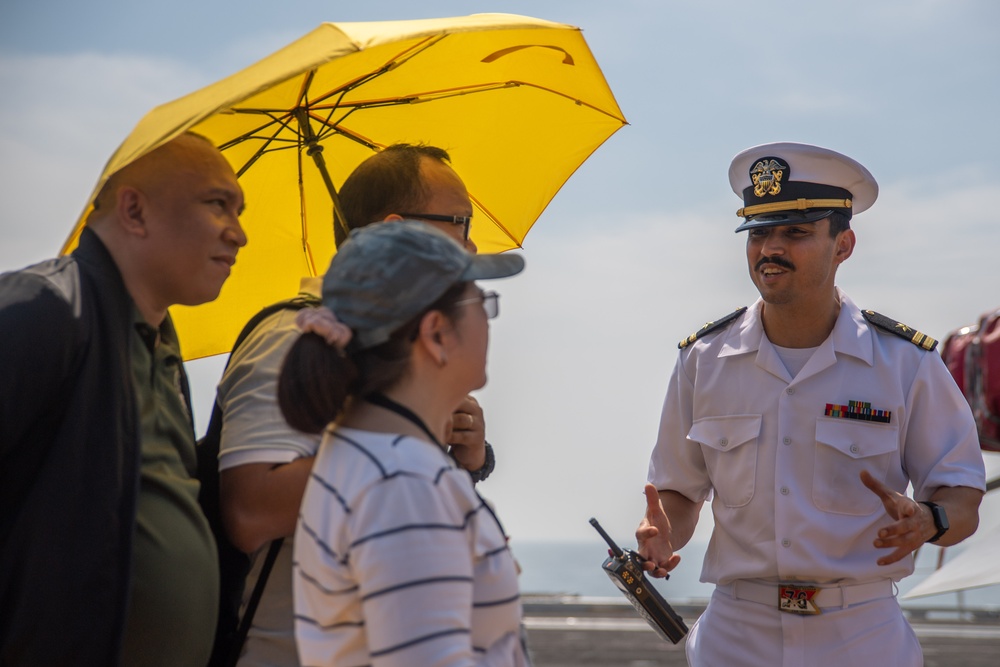USS Ronald Reagan (CVN 76) hosts Republic of Philippines US embassy staff members during a scheduled port visit to Manila, Philippines