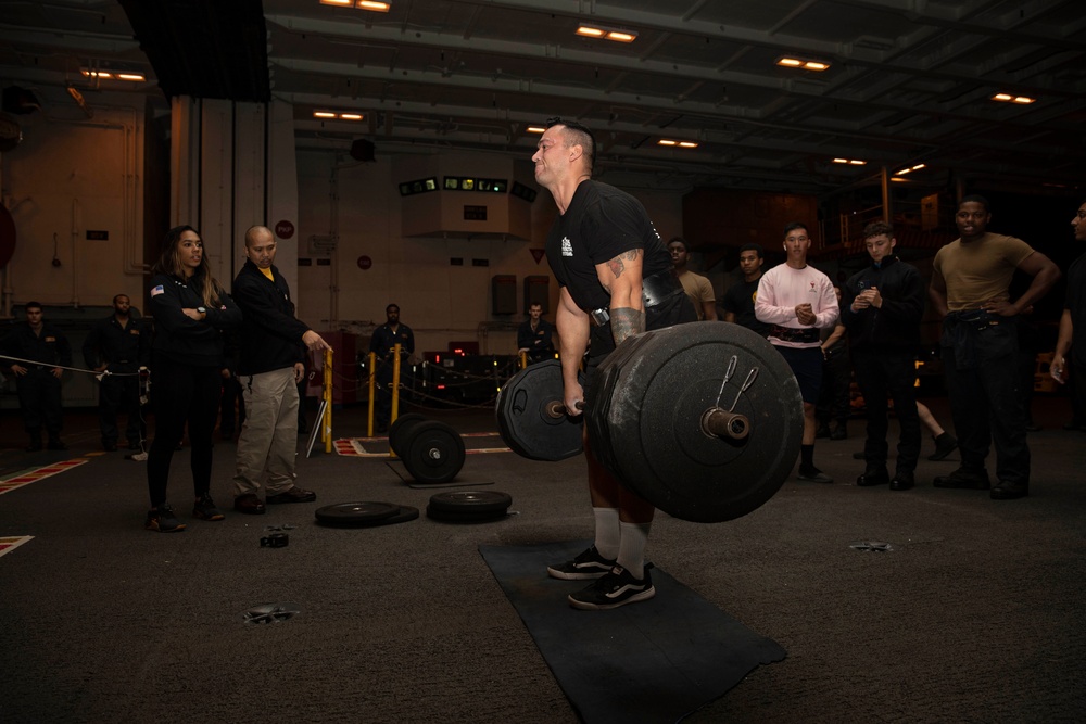 Abraham Lincoln Sailor competes in a deadlift competition