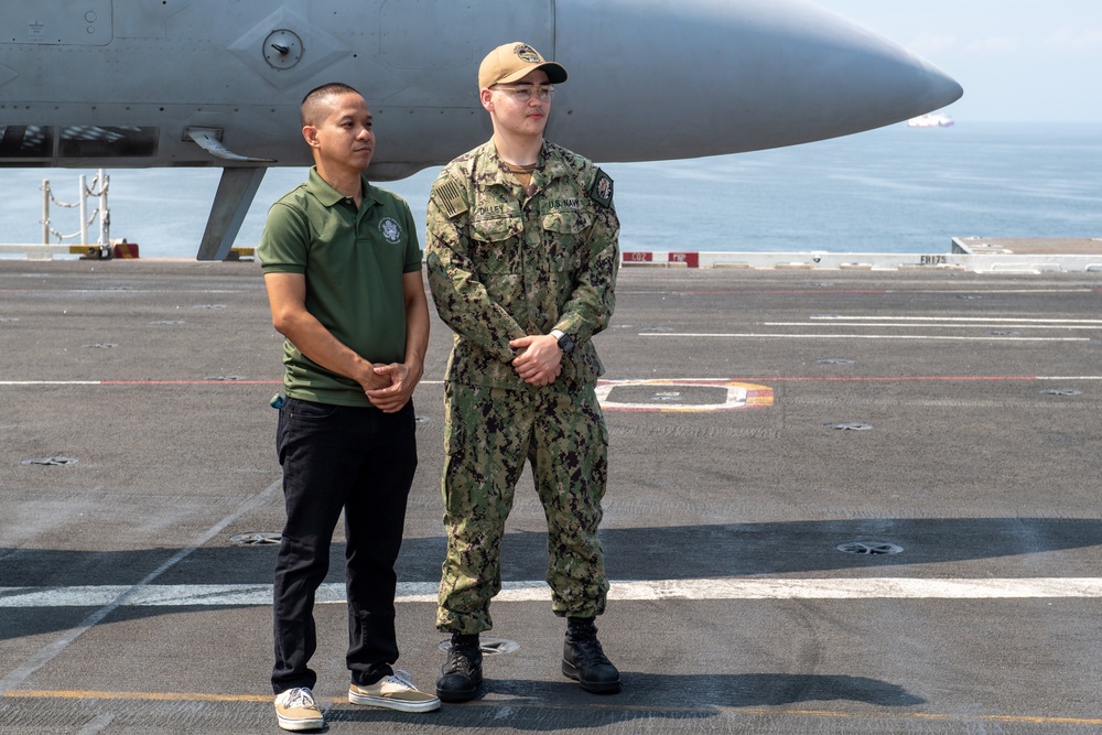 USS Ronald Reagan (CVN 76) hosts Republic of Philippines US embassy staff members during a scheduled port visit to Manila, Philippines