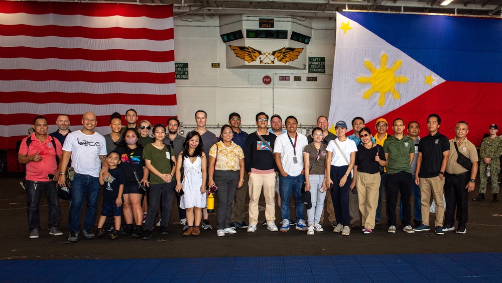 USS Ronald Reagan (CVN 76) hosts Republic of Philippines US embassy staff members during a scheduled port visit to Manila, Philippines