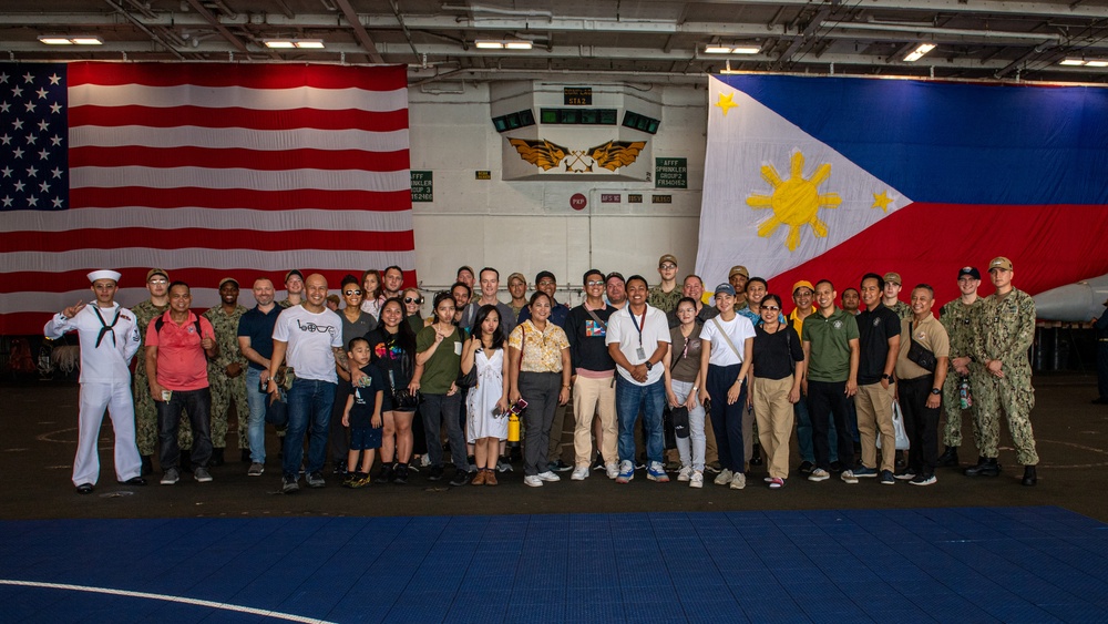 USS Ronald Reagan (CVN 76) hosts Republic of Philippines US embassy staff members during a scheduled port visit to Manila, Philippines