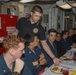 The USS Rafael Peralta (DDG 115) hosts a celebratory meal for Sailors born in September and October
