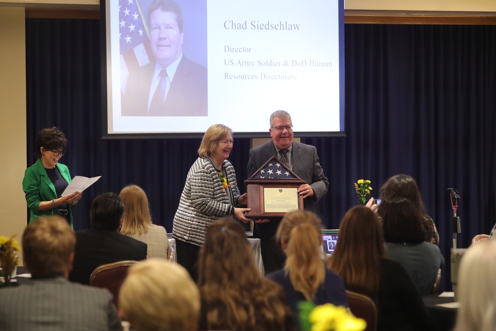 Human Resources Director Karen Kohn celebrates her career at retirement ceremony at Fort McCoy