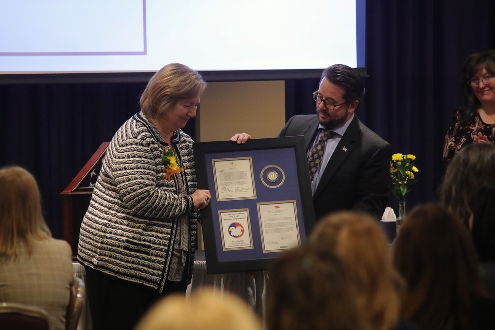 Human Resources Director Karen Kohn celebrates her career at her retirement ceremony at Fort McCoy