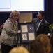 Human Resources Director Karen Kohn celebrates her career at her retirement ceremony at Fort McCoy