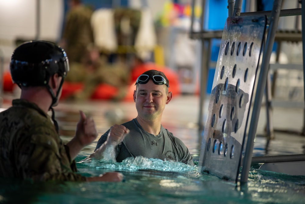 Spangdahlem SERE conducts water survival preparation with 1-214 GSAB