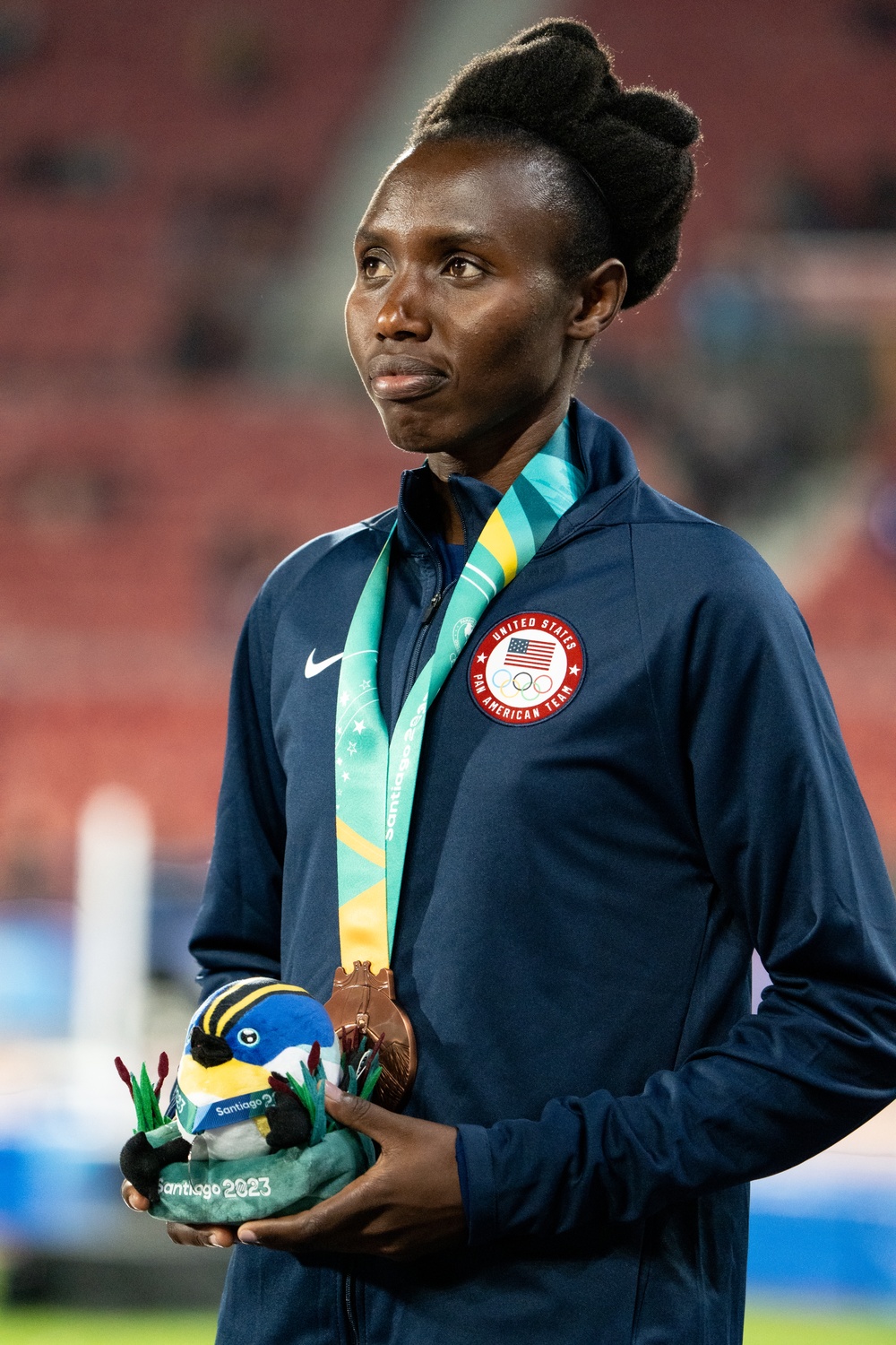 Sgt. Ednah Kurgat wins the bronze medal in the women's 10,000-meter run at the Pan American Games