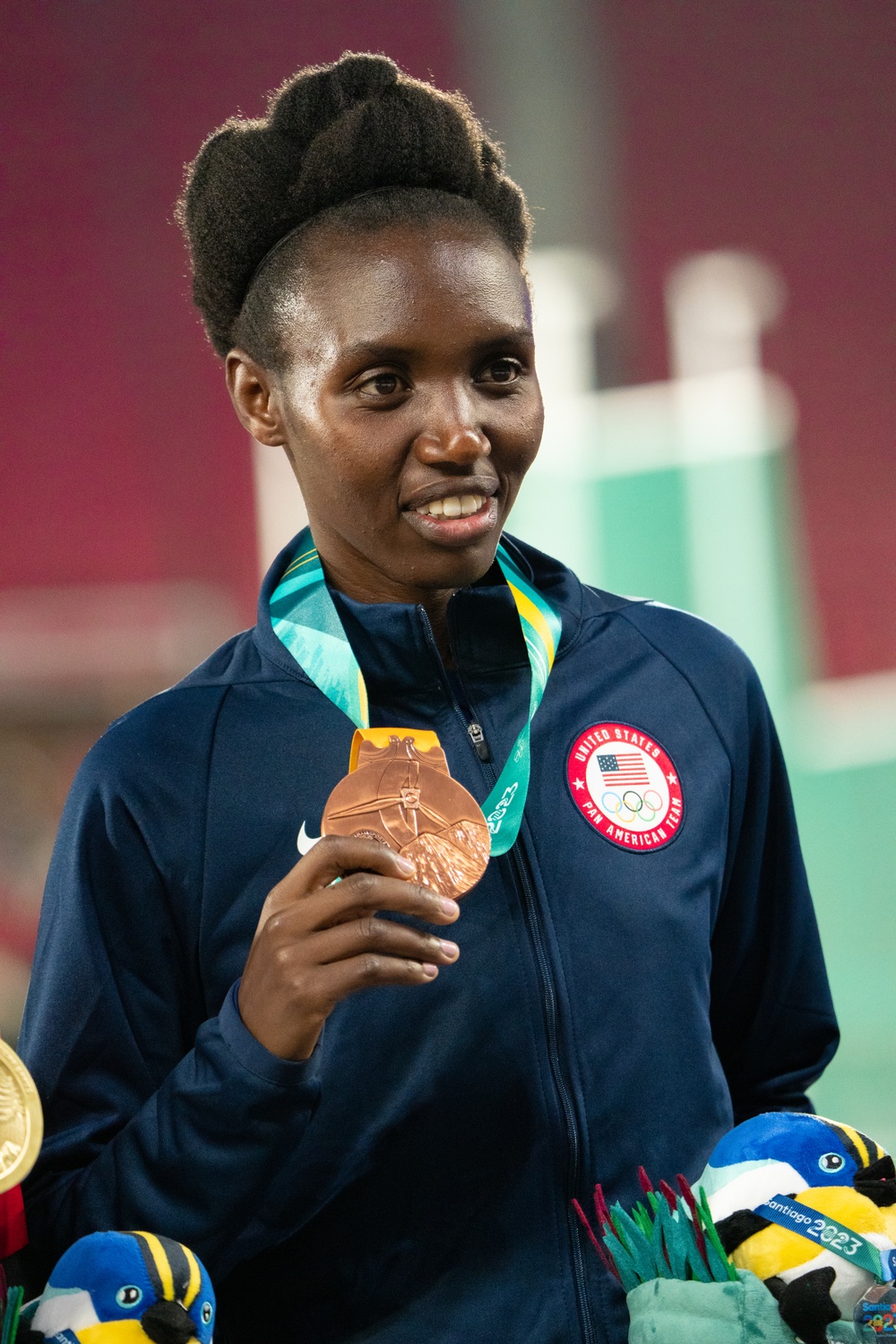 Sgt. Ednah Kurgat wins the bronze medal in the women's 10,000-meter run at the Pan American Games