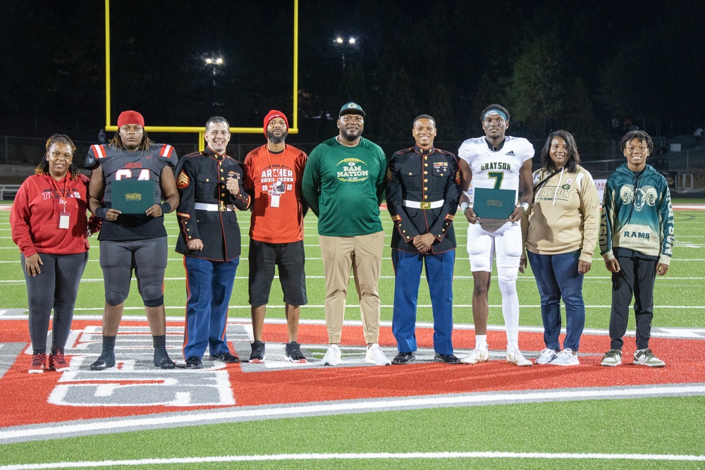 Marines attend a Great American Rivalry Series 2023 Championship game