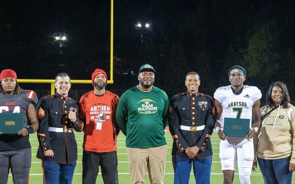 Marines attend a Great American Rivalry Series 2023 Championship game