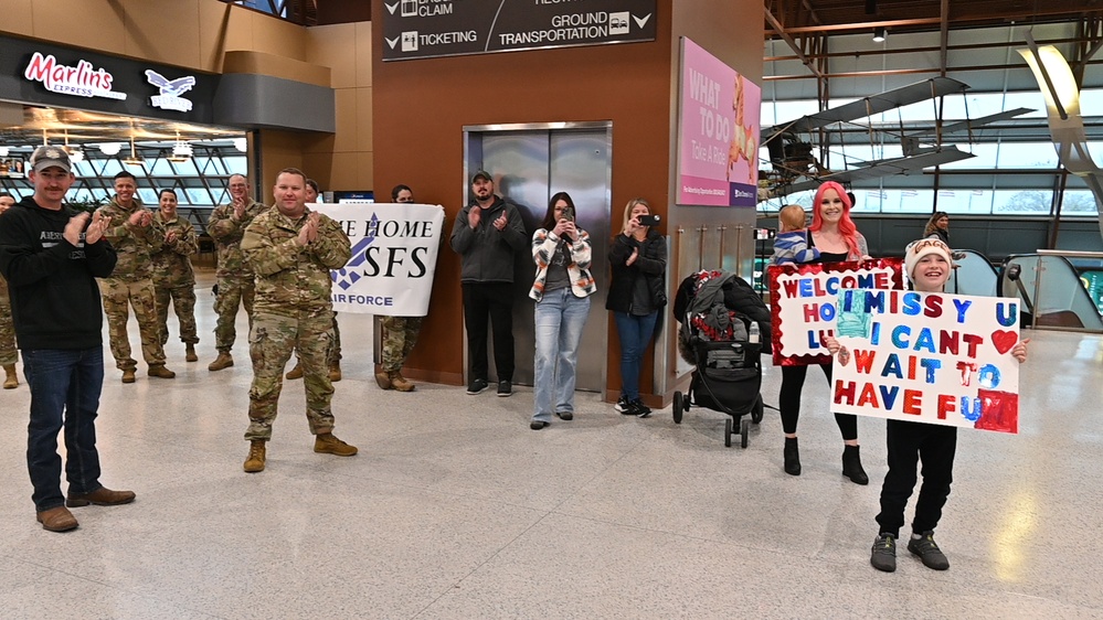 119 SFS Airman Returns Home