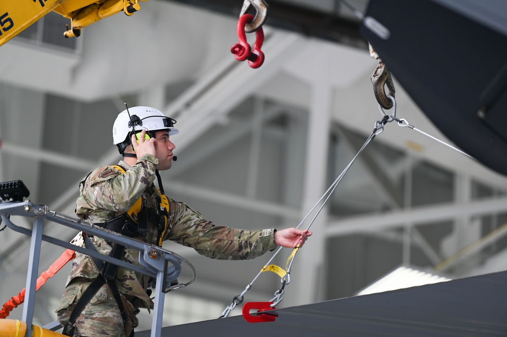 Pease Airmen Install First Flight Control Surface