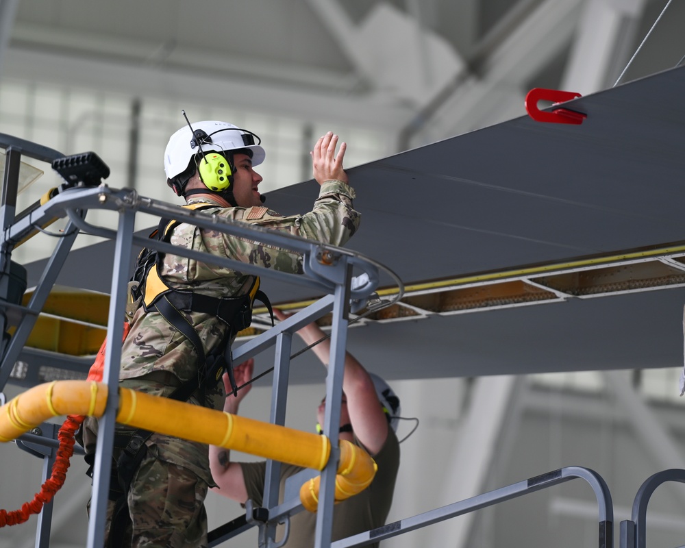 Pease Airmen Install First Flight Control Surface