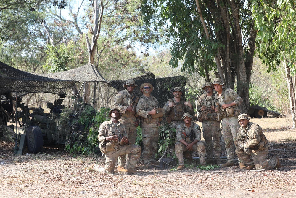 Charlie Battery, 3-7th Field Artillery soldiers pose for a photo