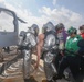 Sailors aboard the USS Rafael Peralta (DDG 115) conduct a crash and salvage drill in the South China Sea