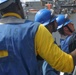 Sailors aboard the USS Rafael Peralta (DDG 115) conduct a replenishment-at-sea with the Lewis and Clark-class dry cargo USNS Wally Schirra (T-AKE-8) in the South China Sea