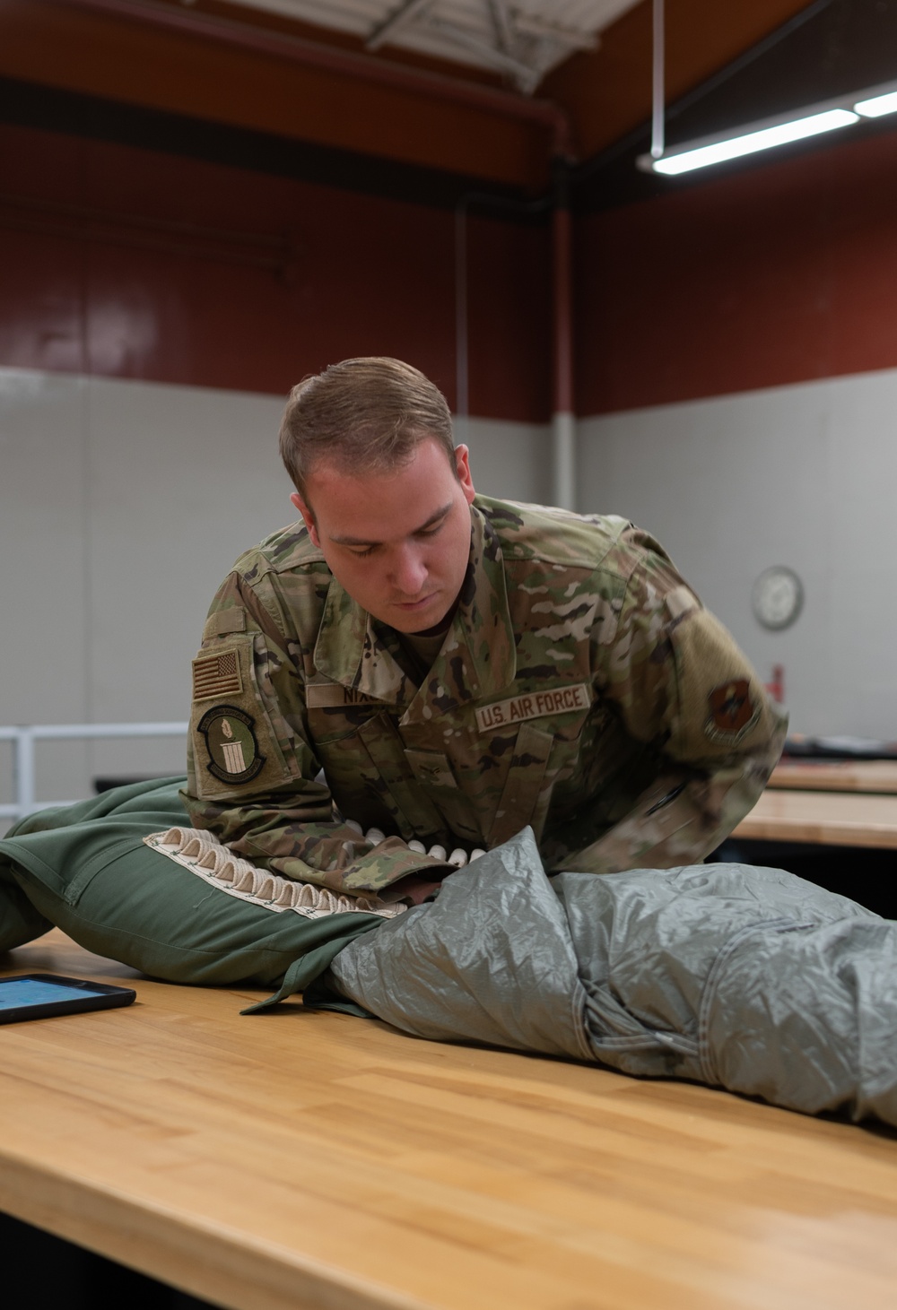 DVIDS - Images - SERE Riggers Pack Parachutes for Training [Image 3 of 7]