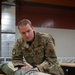 SERE Riggers Pack Parachutes for Training