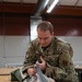 SERE Riggers Pack Parachutes for Training