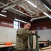 SERE Riggers Pack Parachutes for Training