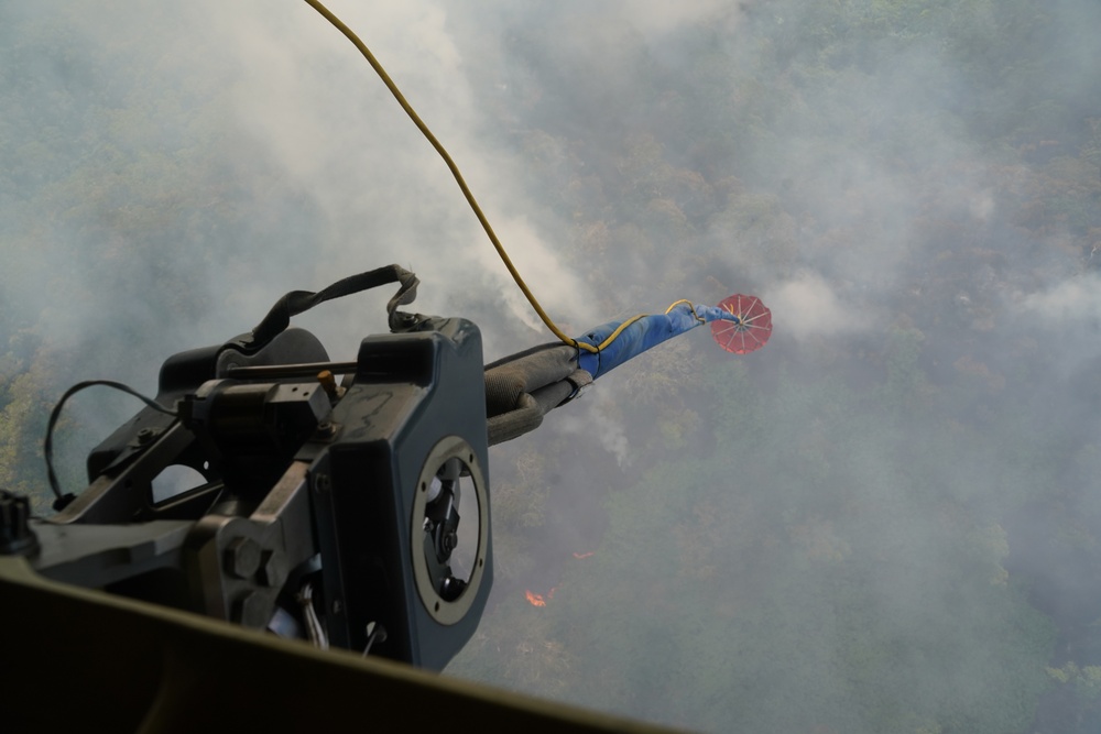 Hawaii Army National Guard provides aerial fire suppression for wild fire in Mililani