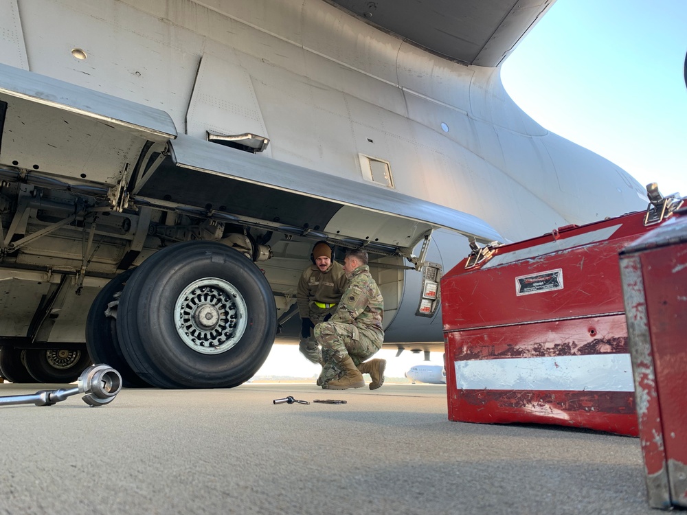 C-17 Globemaster III mechanic changes brakes