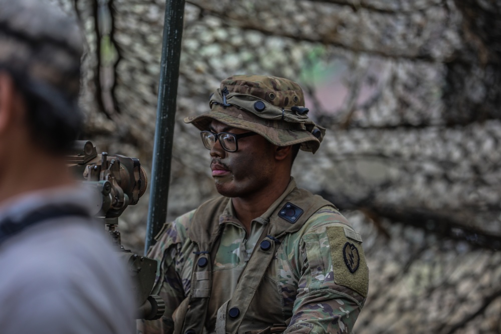 3-7 Field Artillery Soldier stands by for fire mission during JPMRC