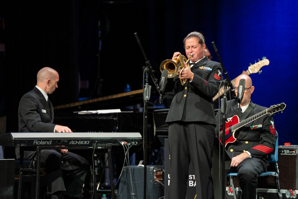 A flugel horn solo by Musician 1st Class Ally Albrecht while performing at Howard Middle School Academy of Arts.