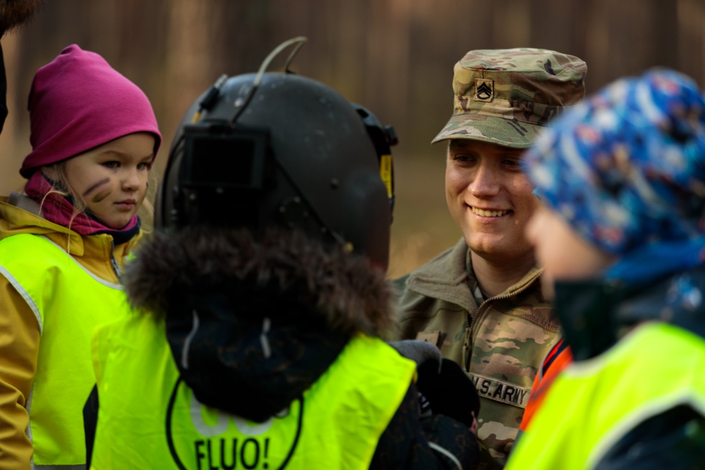 U.S. Army Soldiers supporting NATO’s enhanced Forward Presence Battle Group Latvia participate in Latvian community event