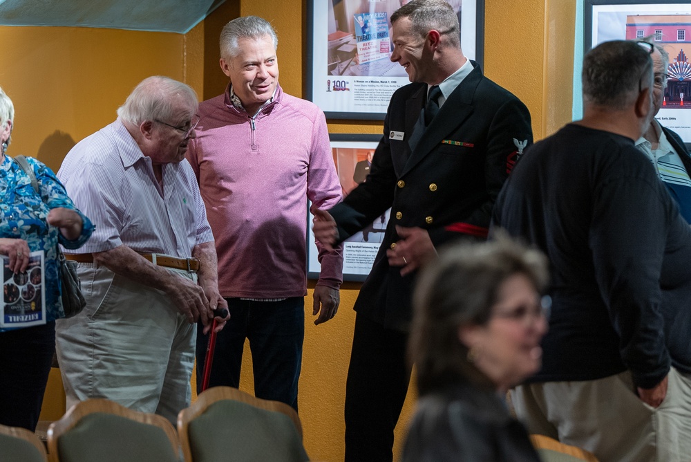 Chief Musician Kevin McDonald talks with veterans