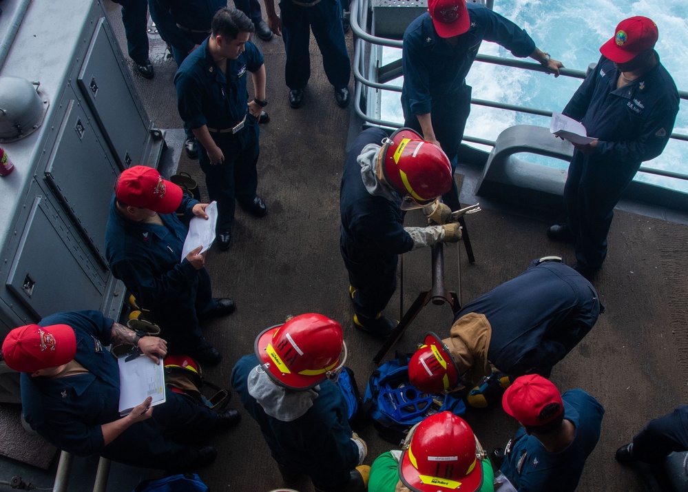USS Ronald Reagan (CVN 76) Sailors conduct In-port Emergency Team drills