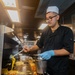 Sailors aboard USS Shoup prepare meals for ship’s crew