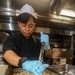 Sailors aboard USS Shoup prepare meals for ship’s crew