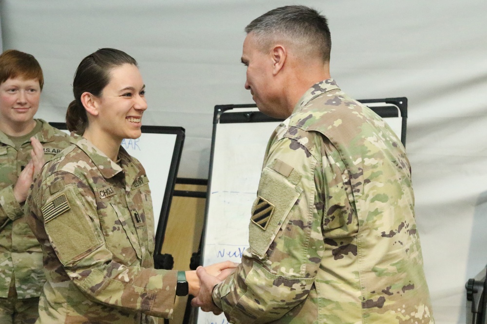 Servicemembers awarded unit coins for CPXIII