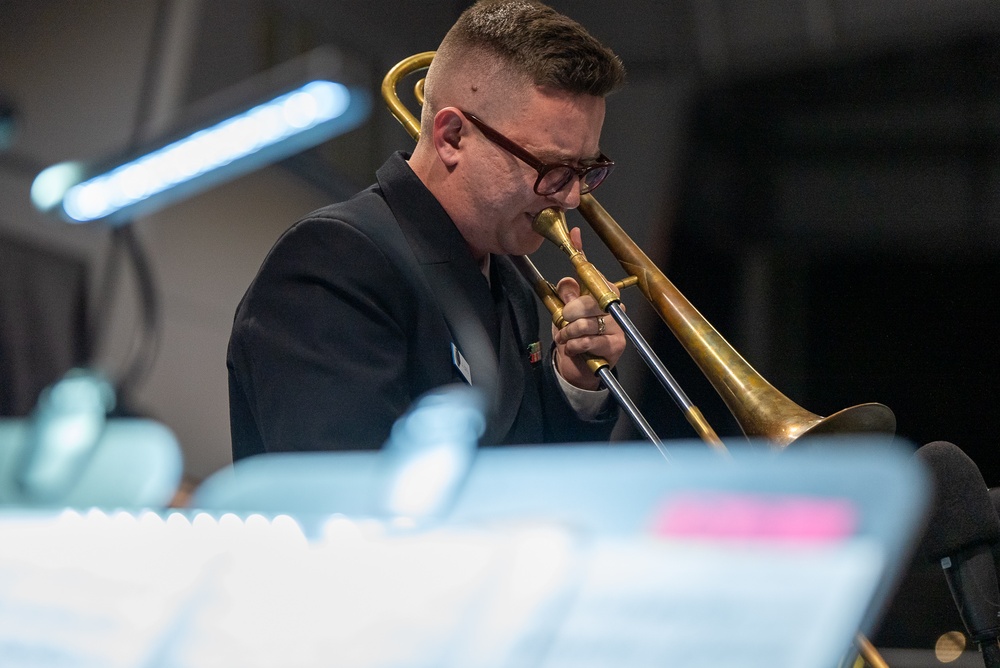 Musician 1st Class David Kapral plays a solo at the MetroHealth Stadium