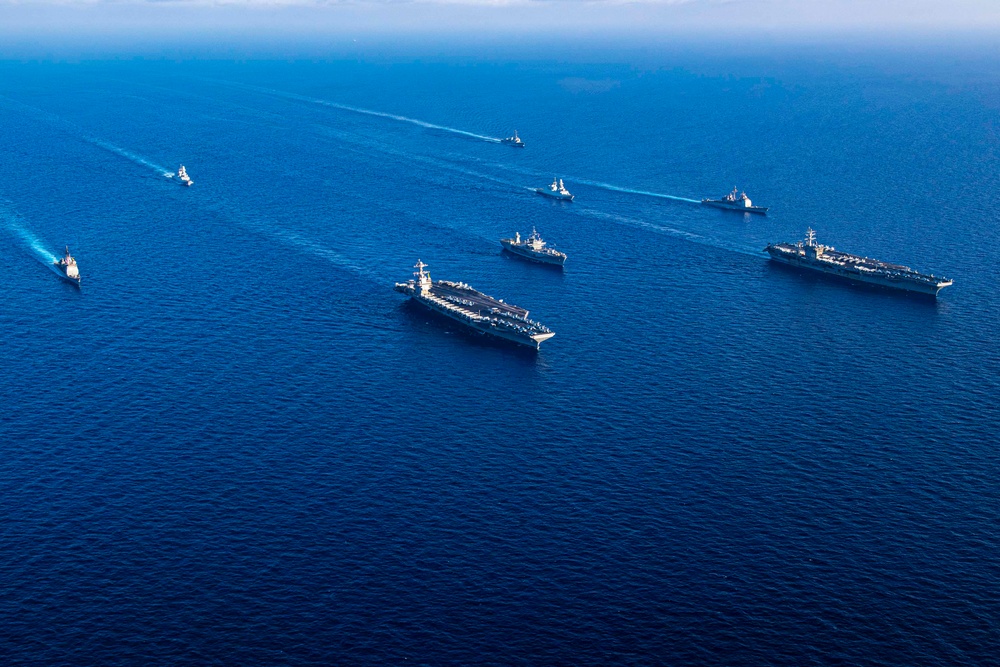 IKECSG sails alongside the Gerald R. Ford (CVN 78) Carrier Strike Group in the Mediterranean Sea