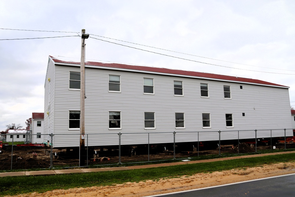 Contractors 'drive' World War II-era barracks buildings at Fort McCoy