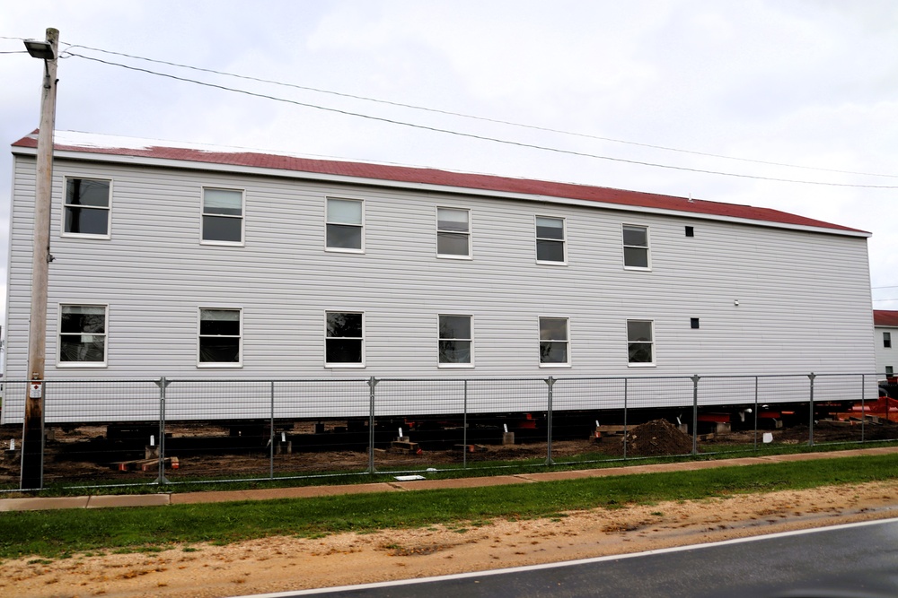 Contractors 'drive' World War II-era barracks buildings at Fort McCoy