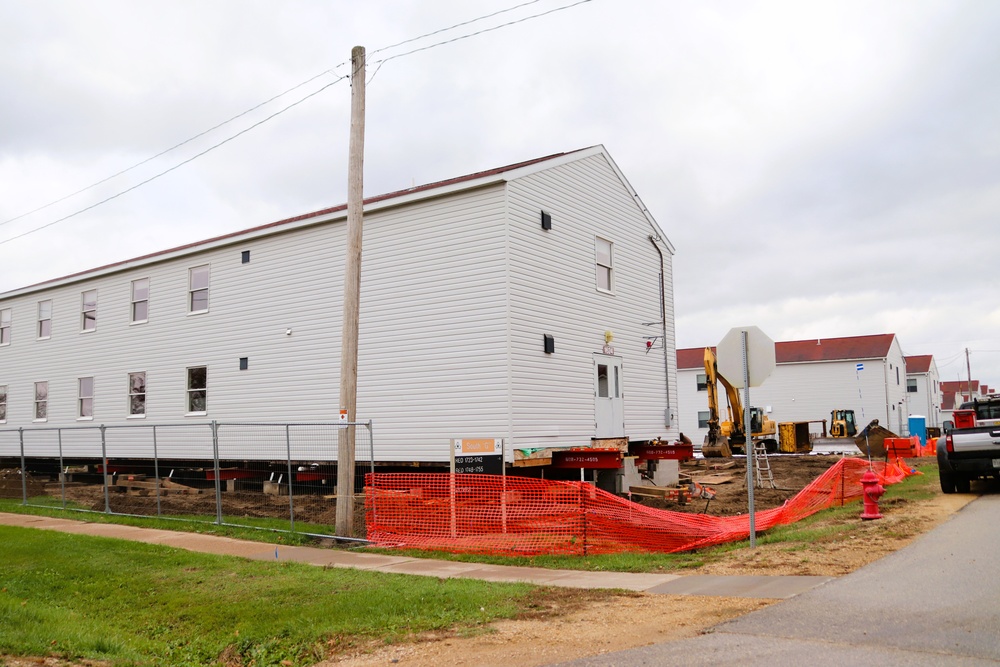 Contractors 'drive' World War II-era barracks buildings at Fort McCoy