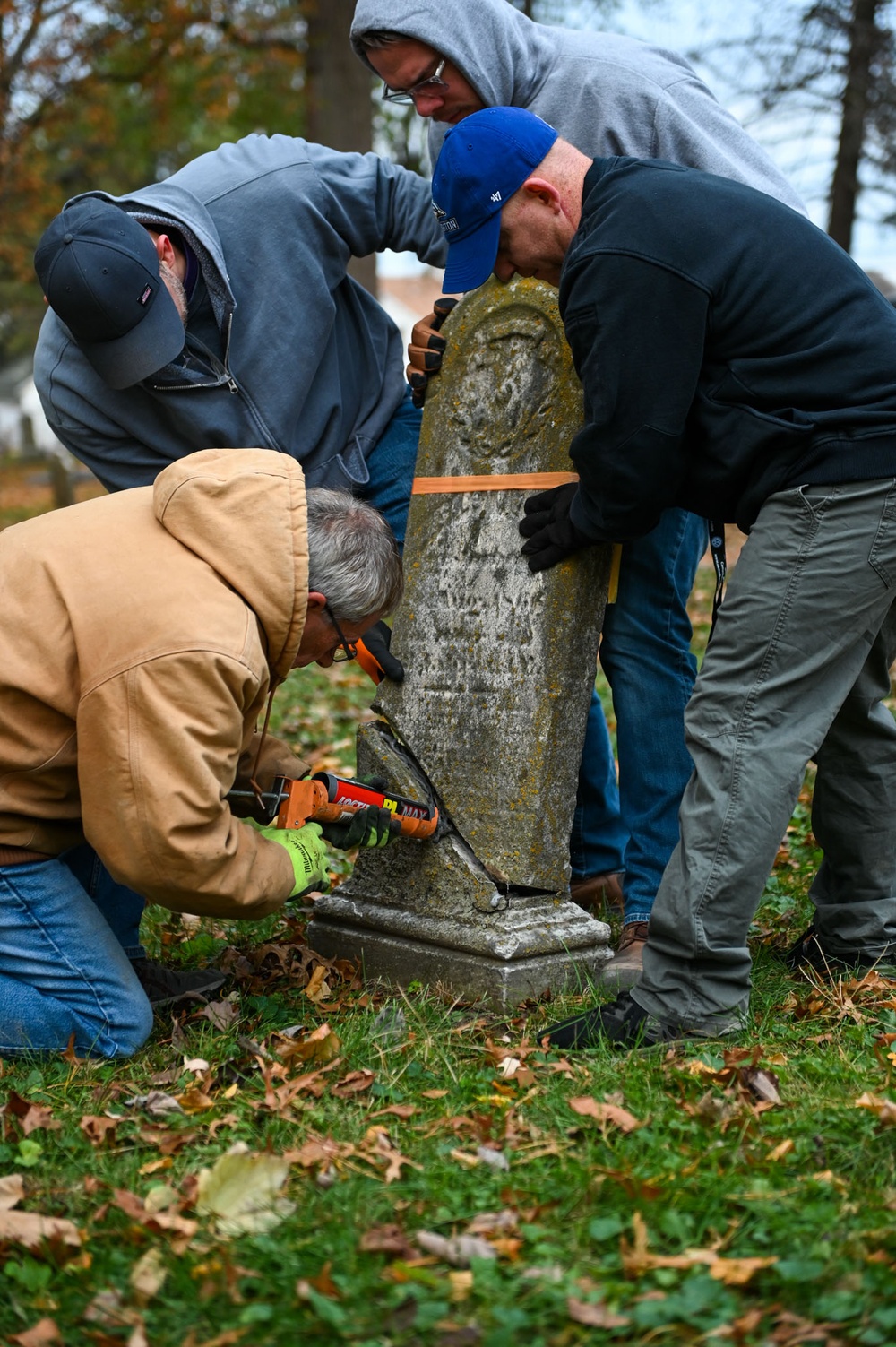 Airmen clean up cemetery where the wing's first commander rests