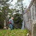 Airmen clean up cemetery where the wing's first commander rests