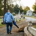 Airmen clean up cemetary where the wing's first commander rests