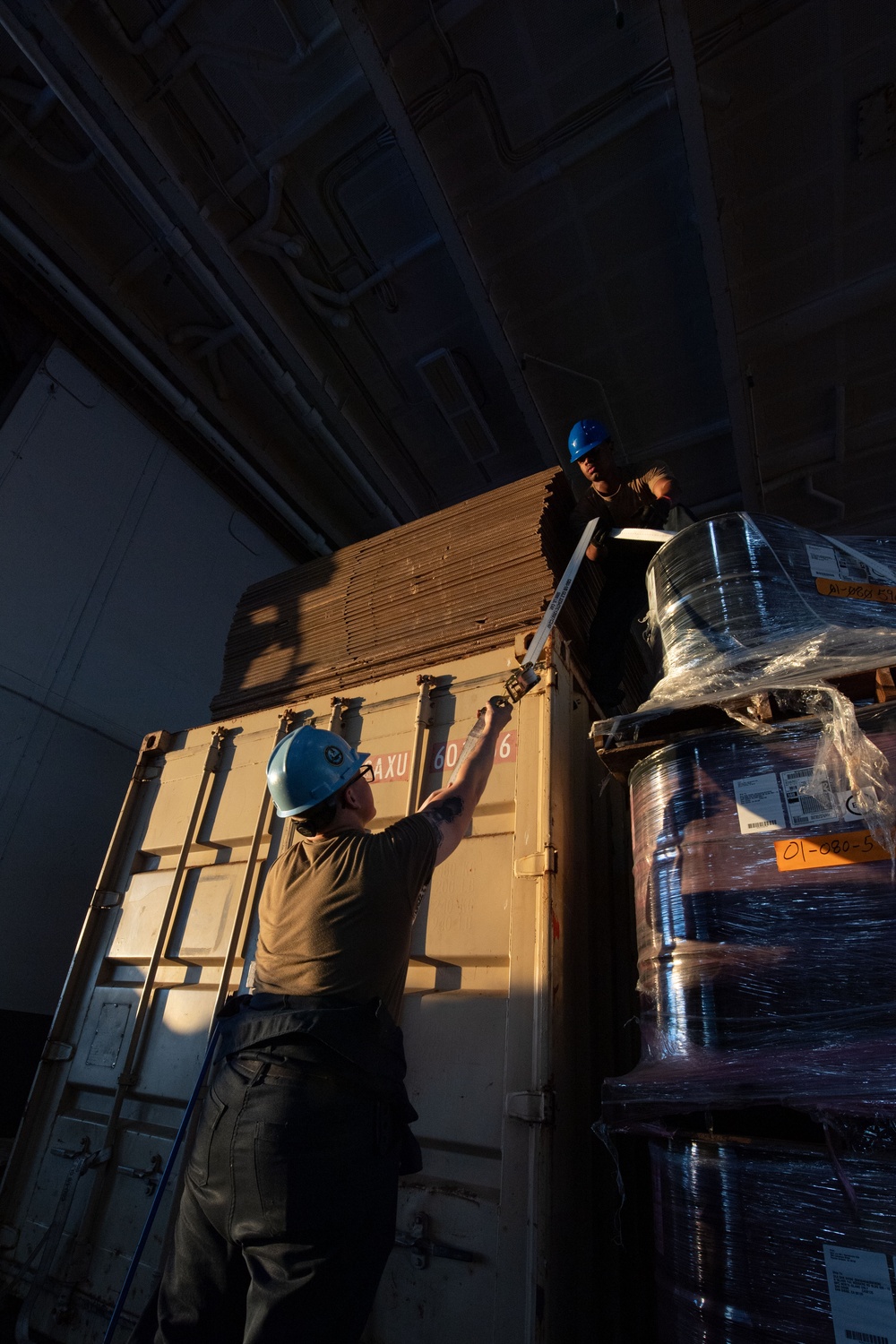 Sunset in the Hangar Bay of USS Theodore Roosevelt