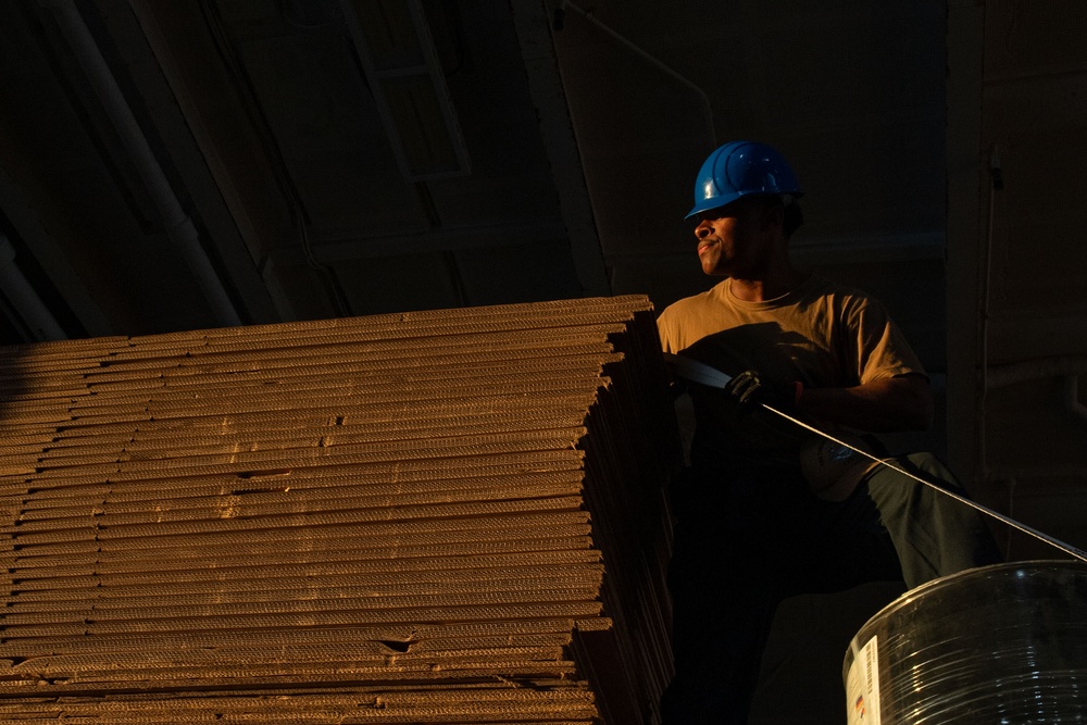 Sunset in the Hangar Bay of USS Theodore Roosevelt