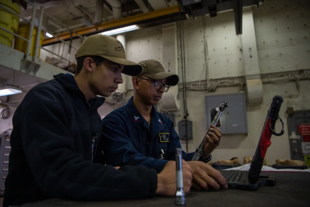 Sailors Conduct Maintenance