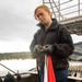 Sailor Prepares Signal Flag