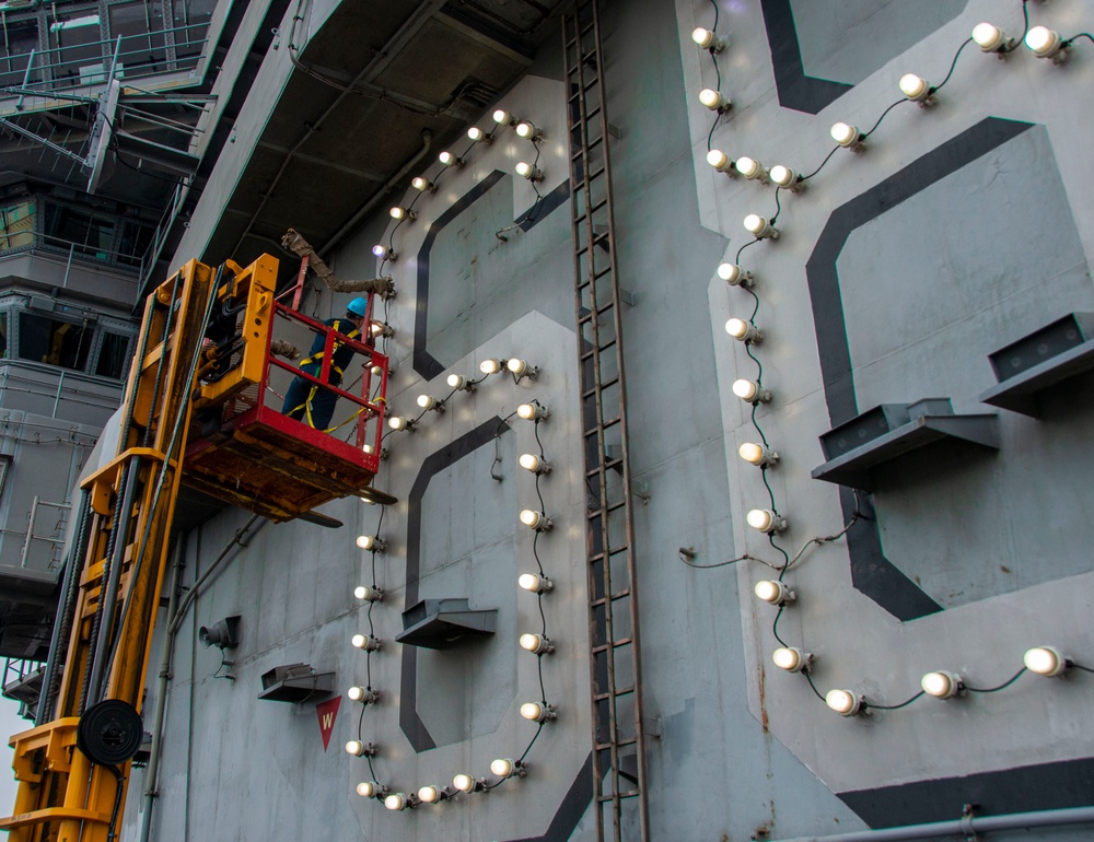 Sailor Repairs Mast Lights