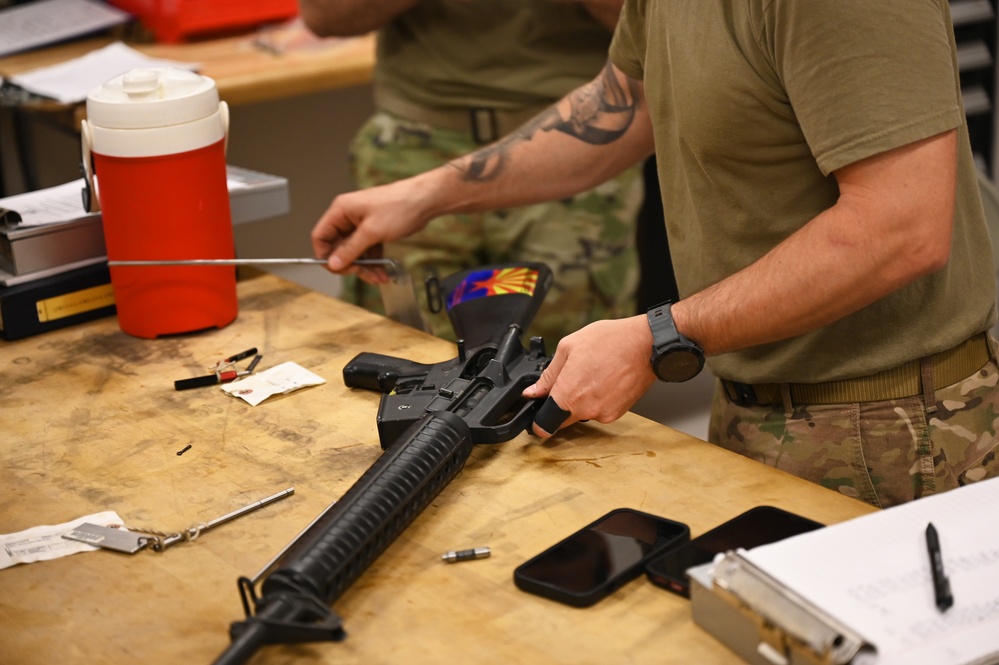 CATM Personnel clean weapons at Goldwater ANG Base